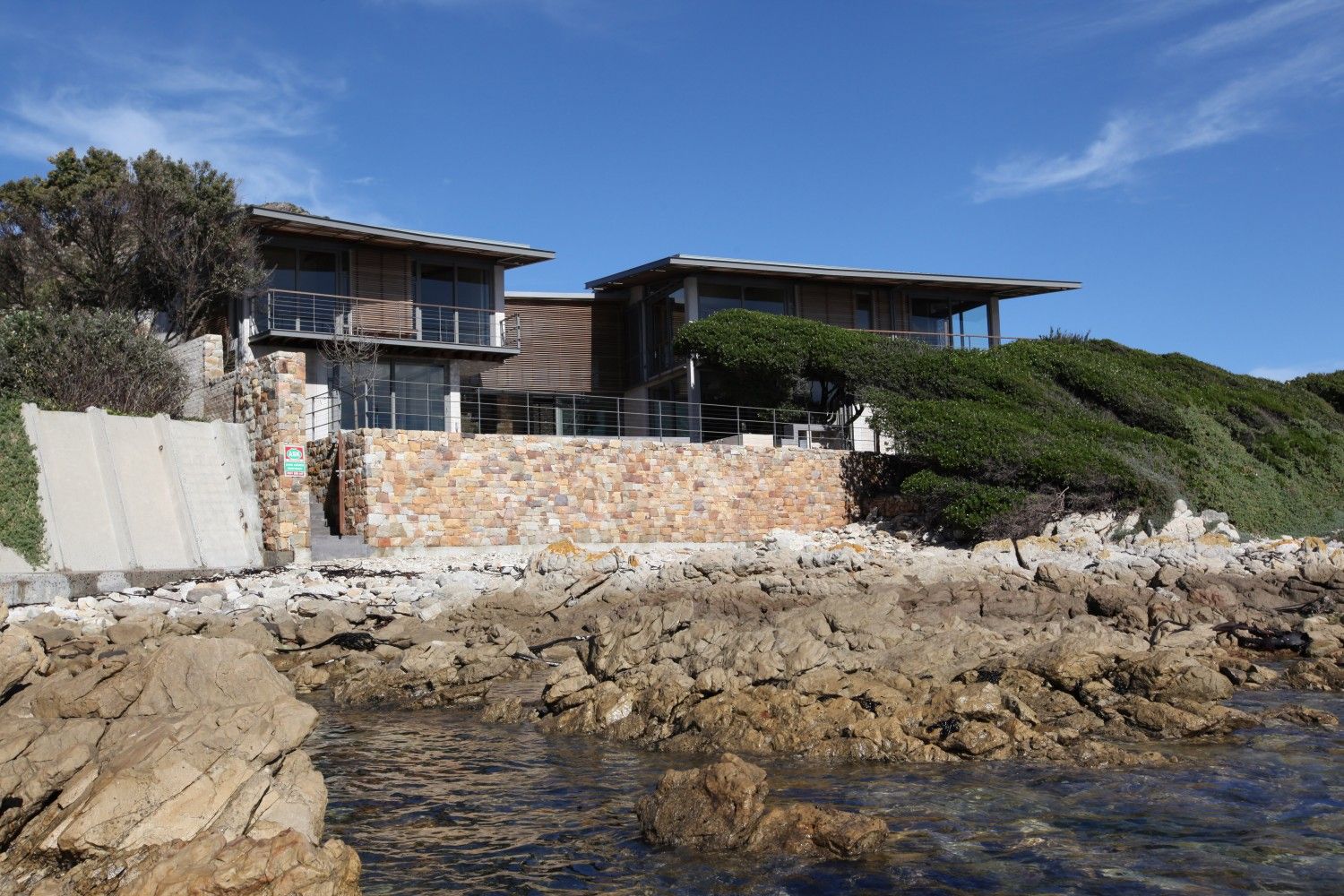 Light weight, sheltering canopies link the coastal thicket across the site